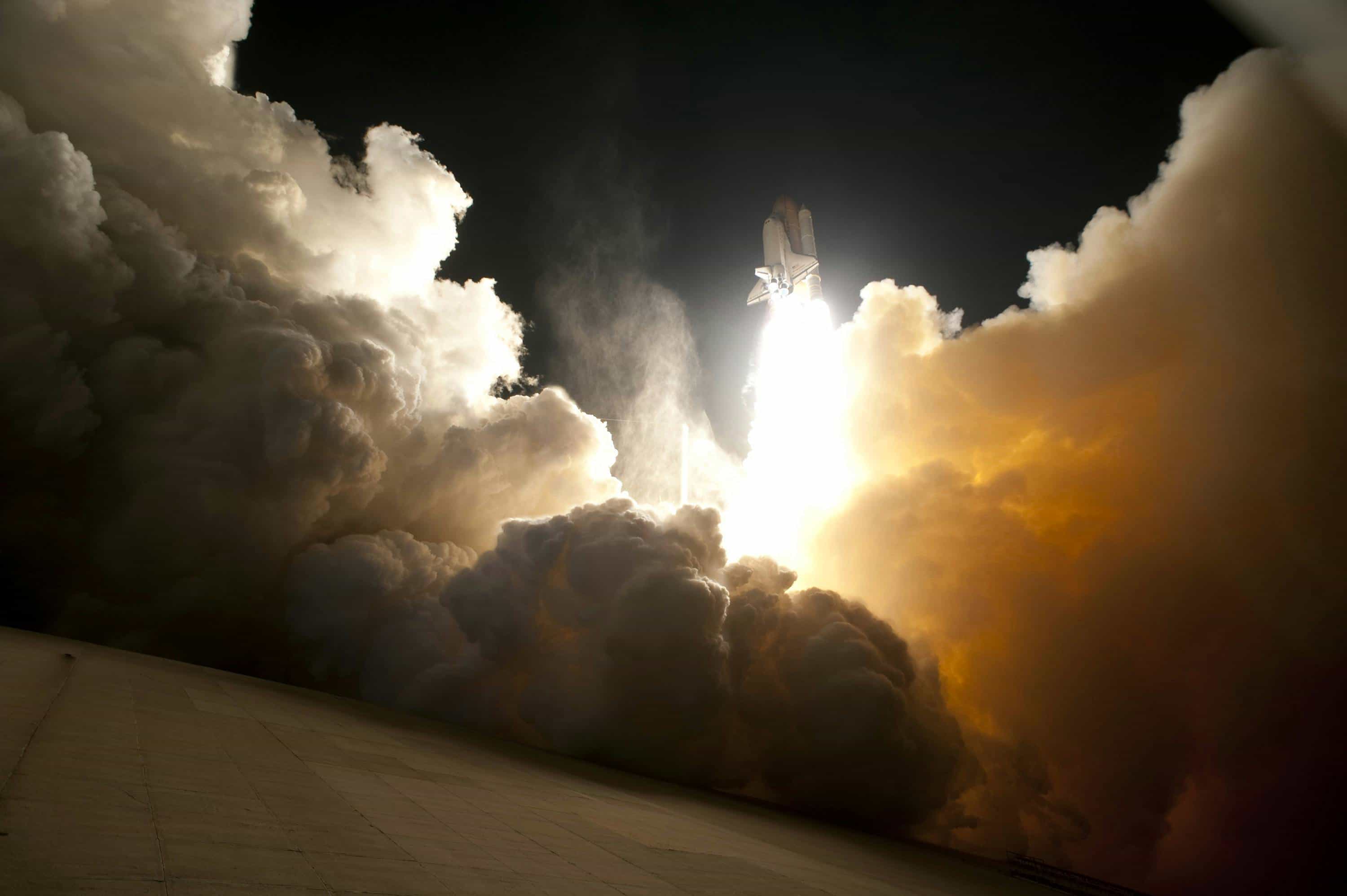 A launch vehicle clearing the pad